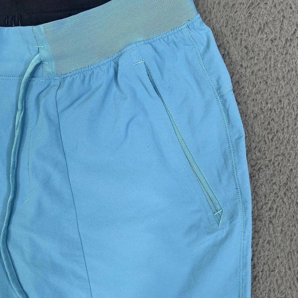 Lululemon License To Train LTT Shorts Mens Small Light Blue Zip Pockets Drawcord